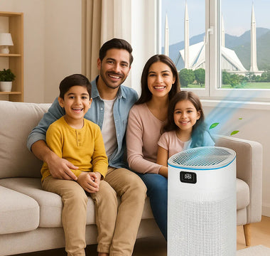 Happy family with children sitting on a sofa beside a smart air purifier in a modern living room