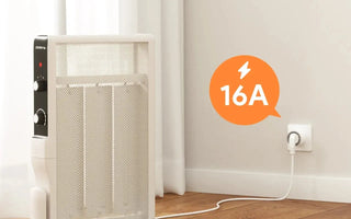 White space heater with 16A power rating, plugged into wall socket on wooden floor near window