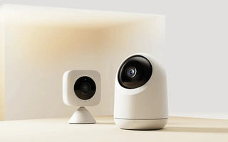 Modern smart home security cameras with WiFi in a minimal indoor setting