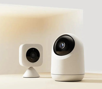 Modern smart home security cameras with WiFi in a minimal indoor setting